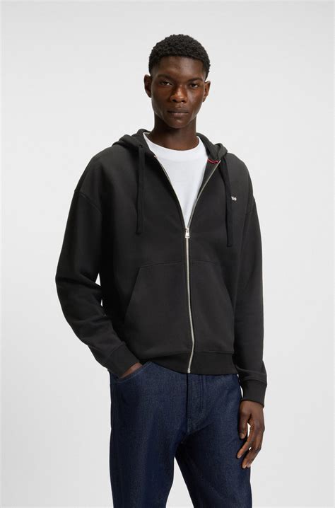 HUGO - Relaxed-fit hoodie in cotton terry with logo detail - Black