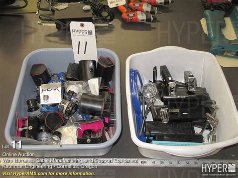 (2) Plastic bins with assorted Micronta 30X illuminated pocket ...