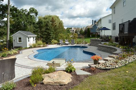 Spruce Up Your Swimming Pool This Summer With These Landscape Design ...