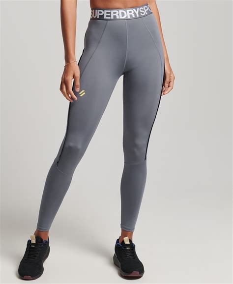 TRAIN BRANDED ELASTIC ORANGE LEGGING