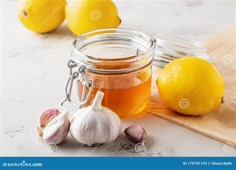 Alternative Medicine, Natural Home Remedy for Cold and Flu. Ginger, Lemon, Garlic and Honey ...