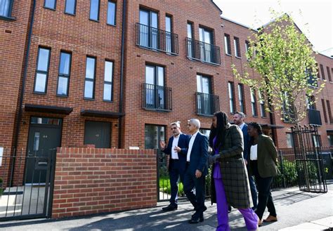 Mayor of London visits a street of newly built, four-bed council homes ...
