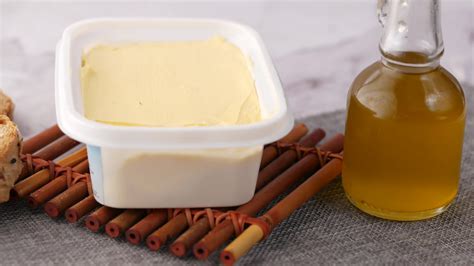 Tub of butter or margarine on placemat on table 15808107 Stock Video at ...