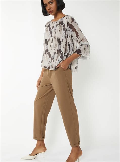 Buy Women Solid Straight Fit Trousers Online at just Rs. 999.0 ...