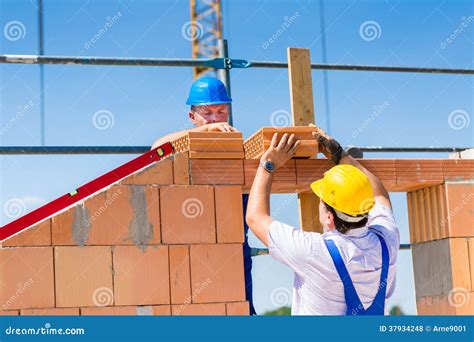 Bricklayer or Builders on Construction Site Working Stock Photo - Image ...