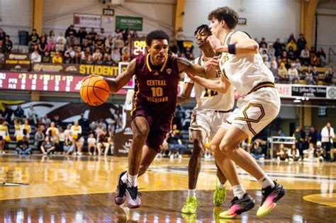 See photos as WMU basketball storms past rival CMU in front of packed ...