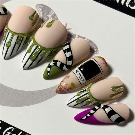 40 Hauntingly Beautiful Halloween Nail Art Ideas for October - DIGIDIA ...