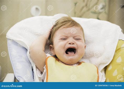 Screaming Crying Baby in a Highchair Stock Photo - Image of girl ...