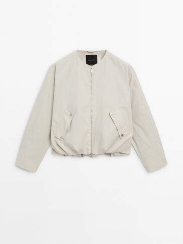 Voluminous bomber jacket with pockets · Beige · Coats And Jackets ...