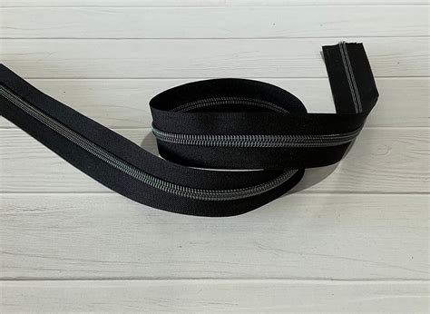 Black tape with Wicked Reflective Rainbow teeth, Size: 5yd | Michaels