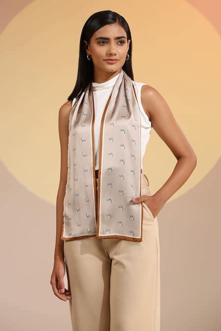 Buy Beige Denali Pony Pattern Neck Scarf by Dusala Online at Aza Fashions.