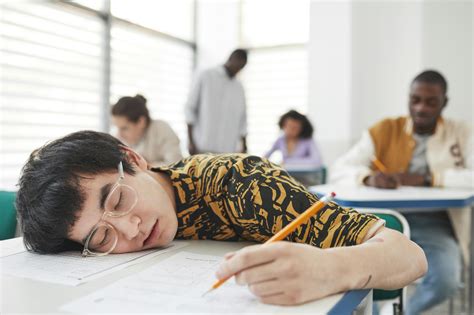 High School Kid Sleeping In Class