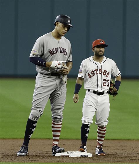 Aaron Judge standing beside of Jose Altuve today. : r/baseball