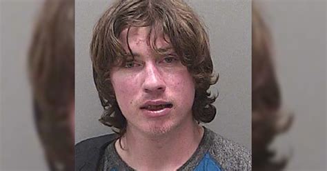 Man arrested after allegedly pulling down his mask at grocery store to ...