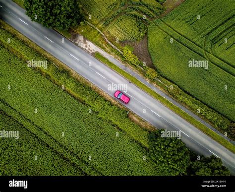 Driving on a country road Stock Photo - Alamy