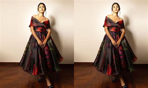 Mrunal Thakur flaunts her curves in halter neck black dress