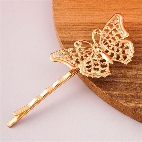 Buy Online Golden Butterfly Pearl Hair Clutch-Ferosh