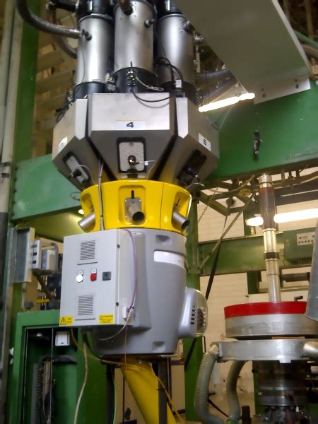 Grado Adroit - Gravimetric batch blender and extrusion control - Doteco