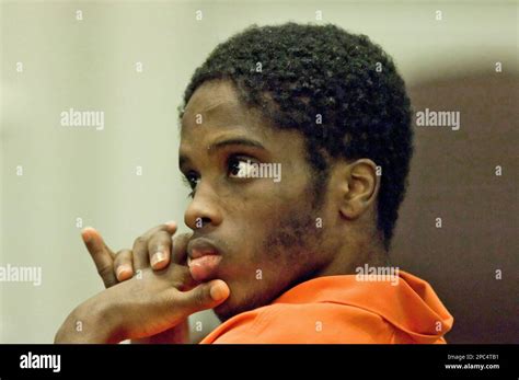 Marvin M. Parker listens as witnesses speak during a sentencing hearing ...