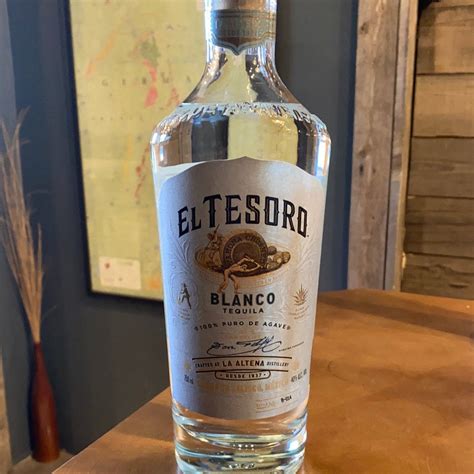 Download A bottle of premium El Tesoro Blanco tequila elegantly ...