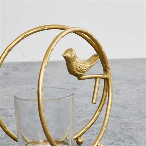 Buy Fiesta Gold Metal Bird Candle Holder from Home Centre at just INR 699.0