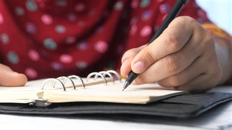 Image result for Writing On Notepad