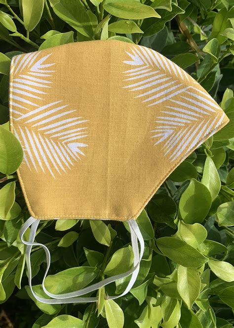 Get Contrast Leaf Printed Yellow Reversible Mask at ₹ 242 | LBB Shop
