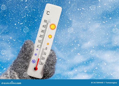 White Celsius Scale Thermometer in Hand. Ambient Temperature Minus 20 Degrees Stock Photo ...