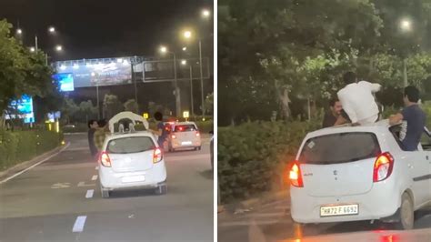 WATCH: Gurugram man drinks, does pushups on moving car in viral video ...