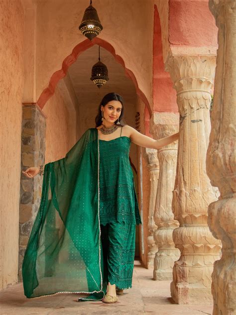 Niki Mehra's bottle green rayon schiffly chikan with sequence work all ...