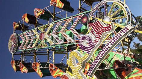 Zipper Roller Coaster Zipper Carnival Ride Spins Against Sky Stock