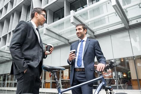 Two Business People Walking Side by Side 的图像结果