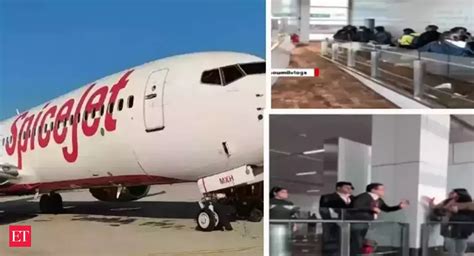 delhi airport aerobridge: SpiceJet flyers wait long at Delhi airport ...