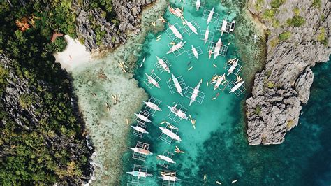 Download wallpaper 2560x1440 bay, aerial view, boats, shore, rocks ...