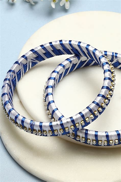 Blue & White Plastic & Thread Bangles