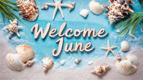 Premium Photo | Welcome June written in cursive on a sky blue ...