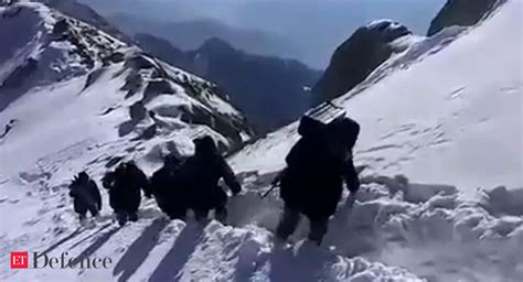 Watch: BSF troops patrolling along LoC in Kashmir amid heavy snowfall ...