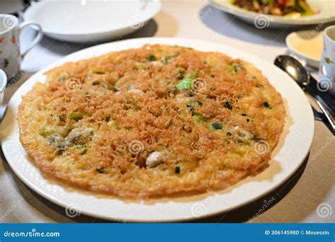 Pan Fried Oyster pancake stock photo. Image of cantonese - 306145980