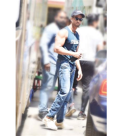 This Hrithik Roshan sleeveless t shirt & jeans look is perfect for summer