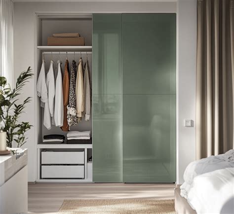 Glossy Green Sliding Wardrobe for a Sleek Modern Bedroom Design
