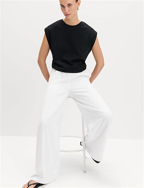 Buy Crepe Elasticated Waist Wide Leg Trousers at Marks & Spencer