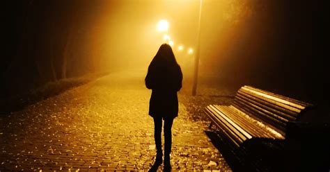 Woman Walking Alone At Night