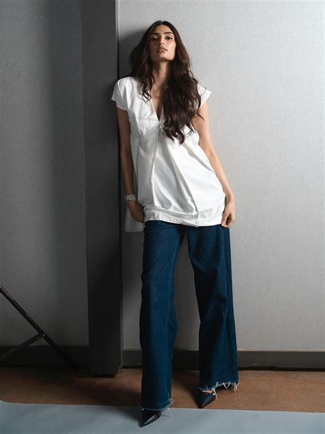 Athiya Shetty shows you how to wear the dress-over-jeans trend | Vogue ...