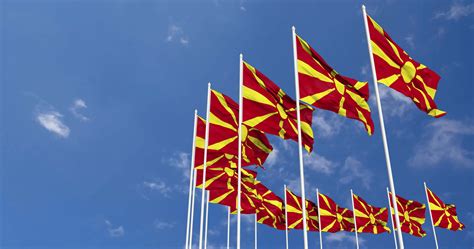 North Macedonia Flags Waving in the Sky, Seamless Loop in Wind, Space ...