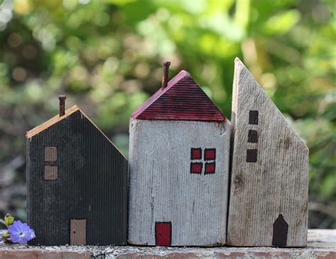 Little wooden houses made from scrap wood board pieces. | House in the ...