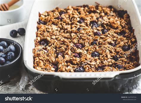 Baked Oatmeal Blueberries Honey Oven Dish Stock Photo 1647537316 ...
