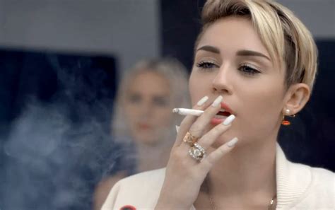 Miley Cyrus Smoking A Cigarette