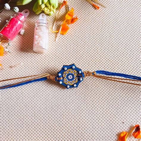 Buy Handmade Embroidered Blue Jaipuri Beads Wooden Rakhi With Roli ...