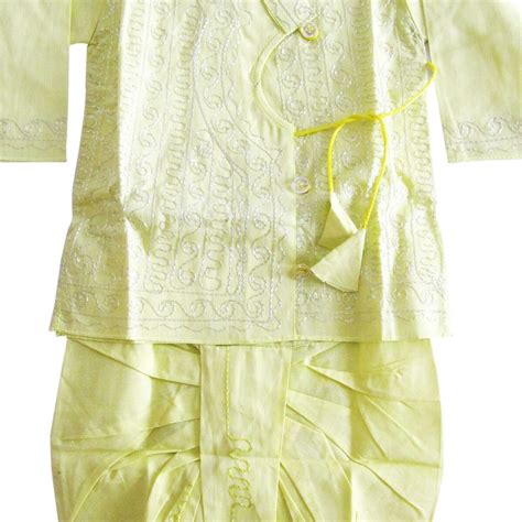 Ethnic Wear in Off-White With Red and Green Embroidery