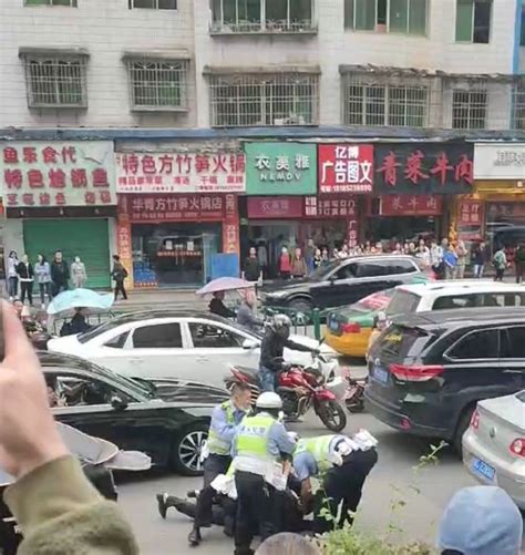 贵州一男子闯红灯后加速冲卡，试图逃跑被警方制服_新闻_情况_警局